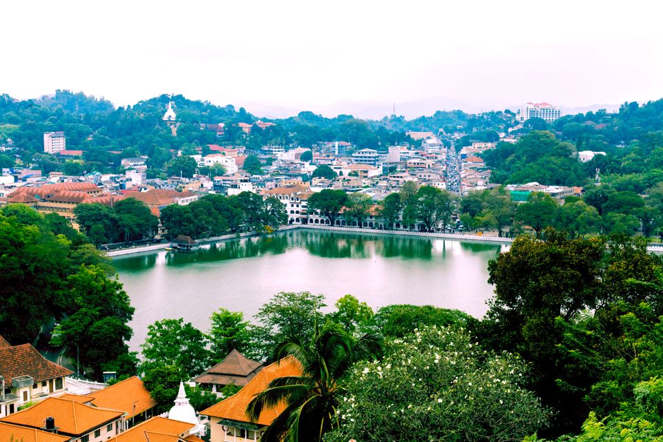 Kandy Lake surrounded by the city and green hills